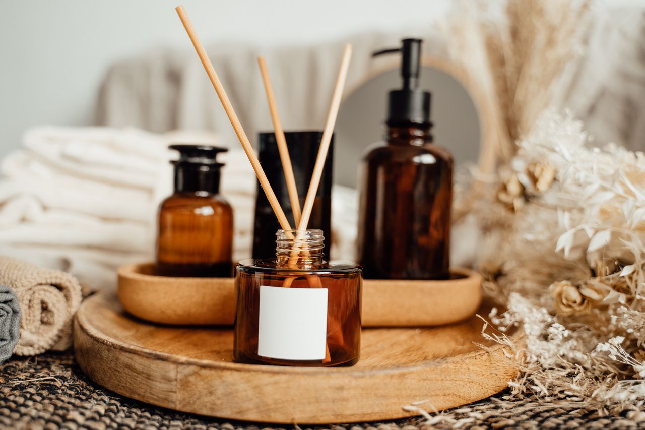 The Art of Drawing Readers In: Your attractive post title goes here A soothing aromatherapy arrangement with amber bottles and dried flowers, perfect for a calming atmosphere.